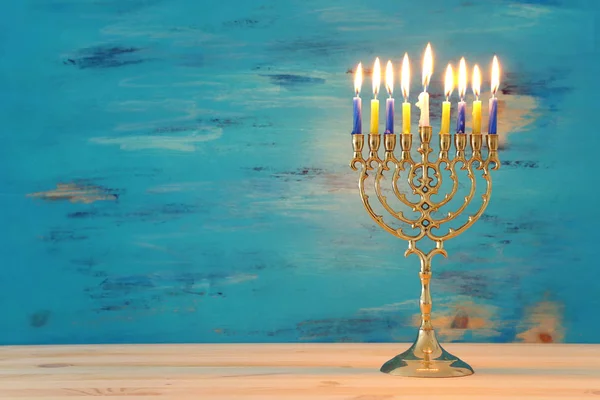 Religion image of jewish holiday Hanukkah background with menorah (traditional candelabra) and candles — Stock Photo, Image