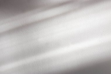 Beyaz desenli duvarın üzerindeki organik gölgenin arkaplanı