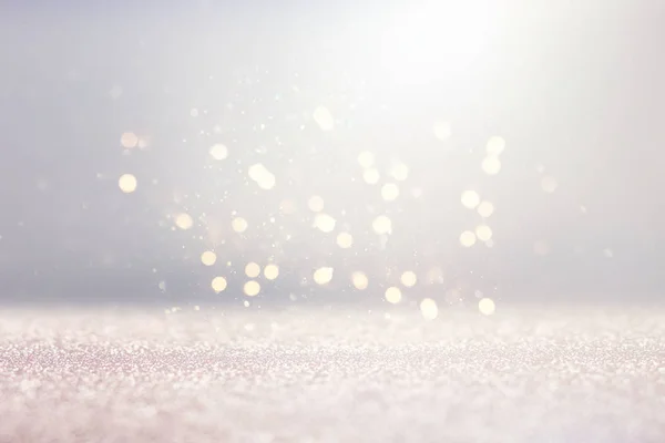 Abstract background of glitter vintage lights . silver, gold and white. de-focused — Stock Photo, Image