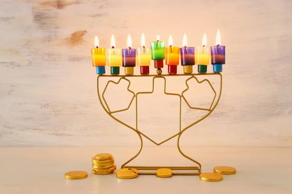 Religion image of jewish holiday Hanukkah background with menorah