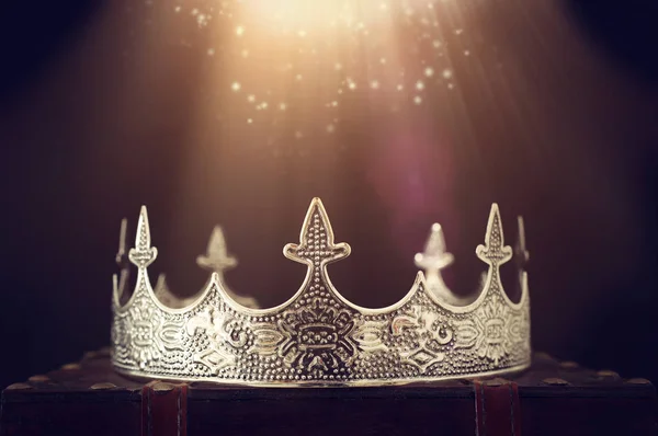 Low key image of beautiful queen/king crown over wooden table. v — Stock Photo, Image