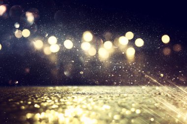 soyut glitter ışıkları arka plan. altın ve siyah. de odaklı