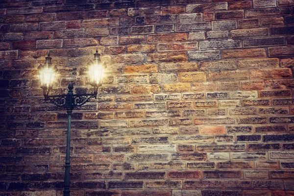 Background of old brick wall and street lantern — Stock Photo, Image