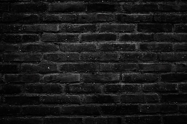 Siyah eski tuğla duvarın arka planı — Stok fotoğraf