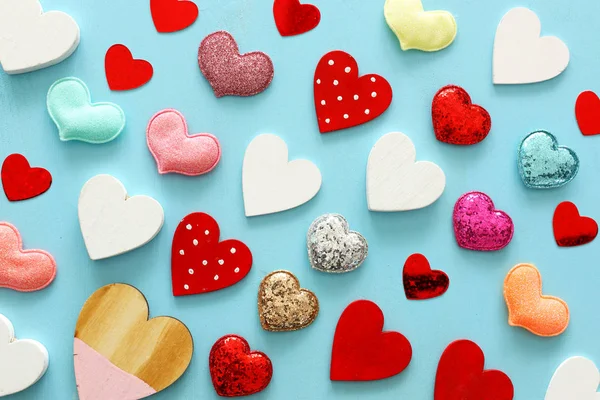 Valentines day concept. many hearts over wooden blue background. Flat lay composition — Stock Photo, Image