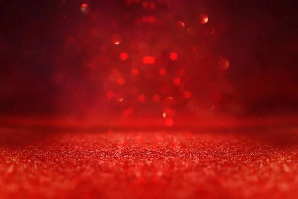 Background of abstract red, gold and black glitter lights. defocused — Stock Photo, Image