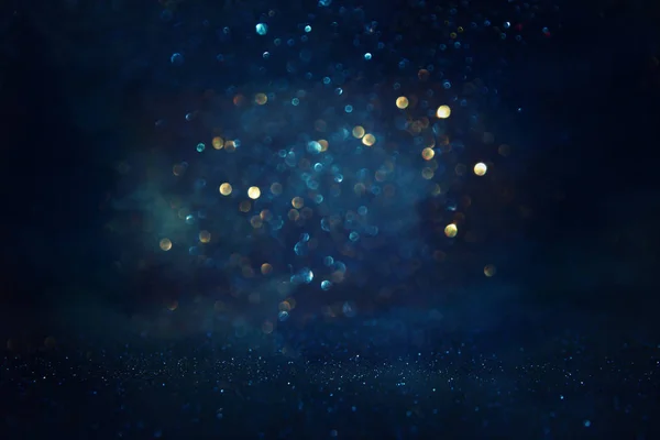 Abstract glitter black, gold and blue lights background. de-focused — 스톡 사진