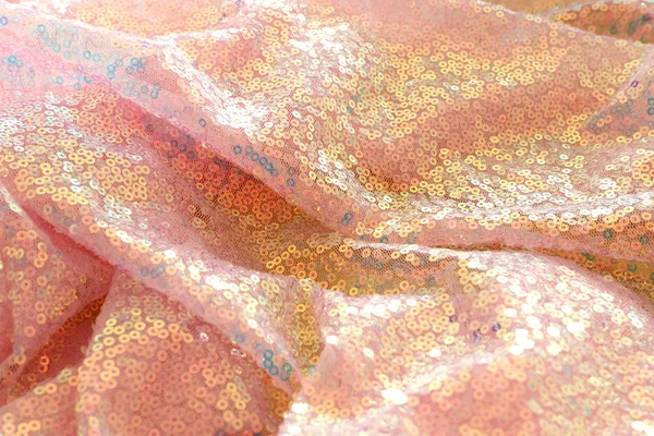 美しい黄金とピンクのスパンコールの生地の背景 — ストック写真