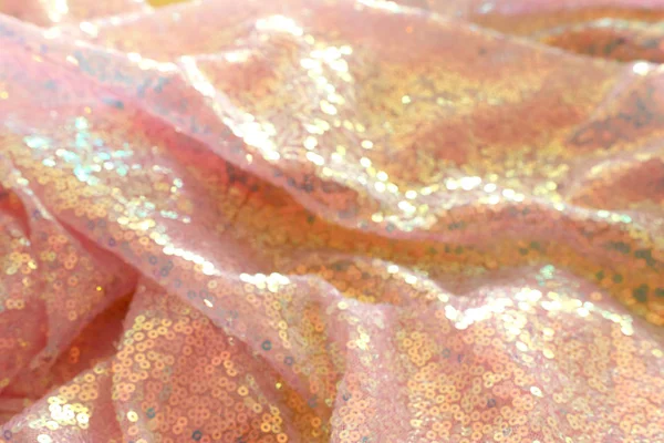 Bokeh and abstract background of beautiful golden sequins fabric — Stock Photo, Image