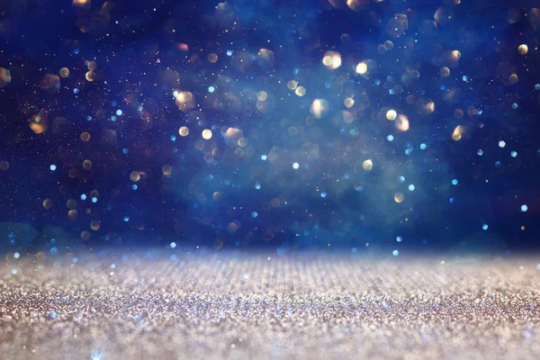 Abstract glitter black, gold and blue lights background. de-focused — Stock Photo, Image