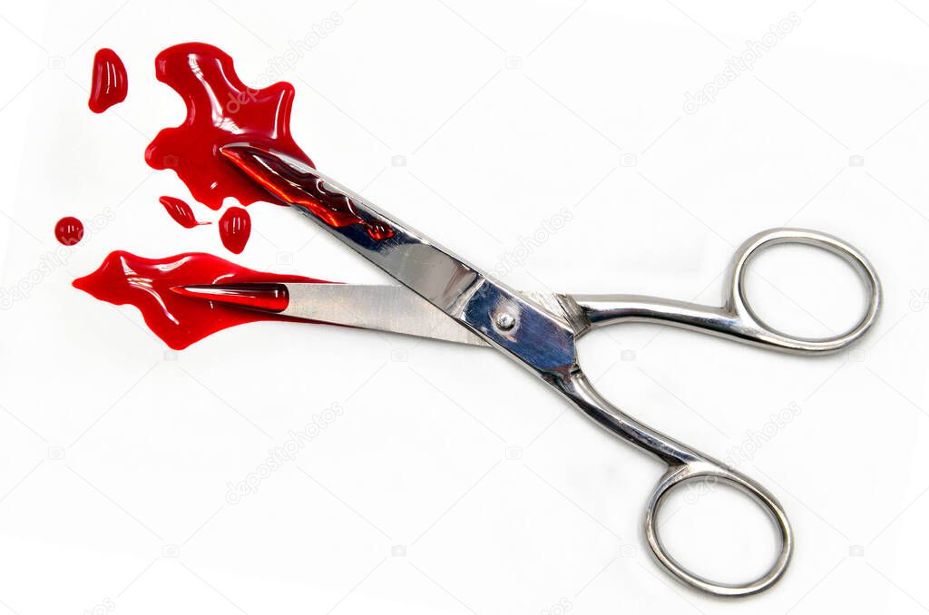 scissor with blood on white background