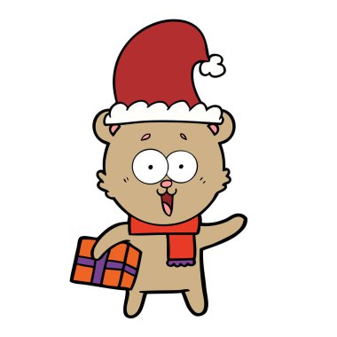 oyuncak ayı Noel hediyesi ile gülüyor