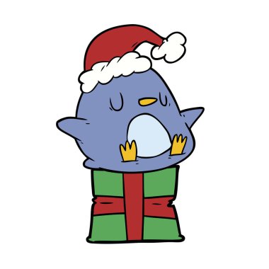 hediye üzerinde oturan sevimli çizgi penguen