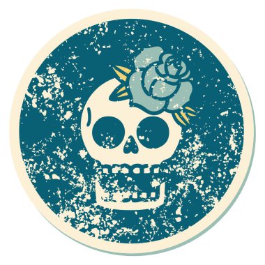 Bir kafatası ve gülün sembolik dövmeli görüntüsü