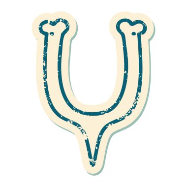 Bir dilek kemiğinin sembolik dövmeli görüntüsü