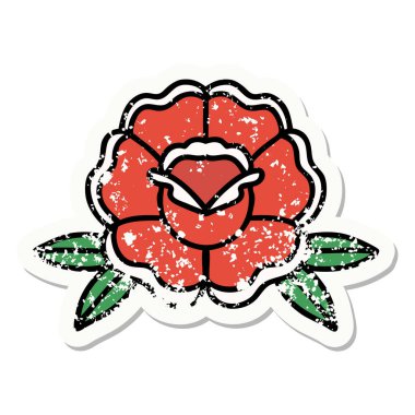 Geleneksel bir çiçek stiliyle dövmesi var.