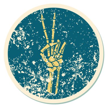 Bir iskeletin barış işareti verdiğinin sembolik dövmesi. 