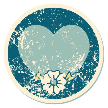 Bir kalp ve çiçeğin sembolik kederli dövme görüntüsü