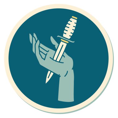 Eline geleneksel bir hançer stili dövme çıkartması takılmış.