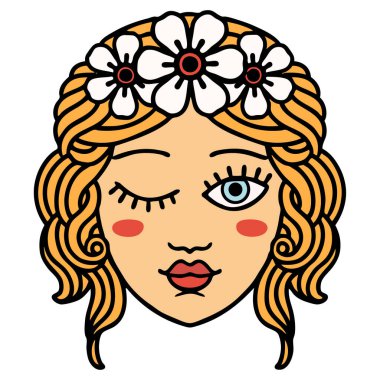 Geleneksel bir dövmeyle genç kızların yüzü göz kırpıyor.