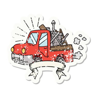 Hurda taşıyan dövme stili bir kamyonun eski çıkartması.