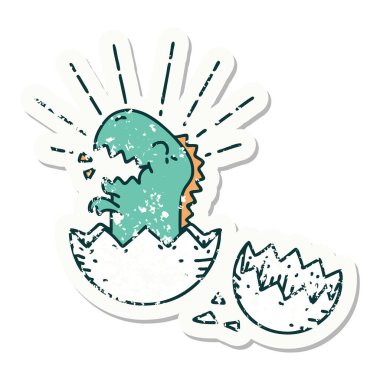 Yumurtadan çıkan bir dinozor dövmesinin eski bir çıkartması.