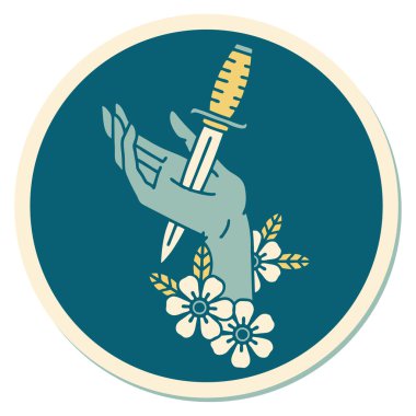 Eline geleneksel bir hançer stili dövme çıkartması takılmış.