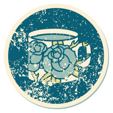 Bir fincanla çiçeğin sembolik dövmeli görüntüsü