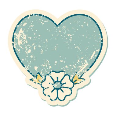 Bir kalp ve çiçeğin sembolik kederli dövme görüntüsü