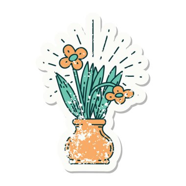 Vazoda dövmeli çiçeklerin eski bir çıkartması var.