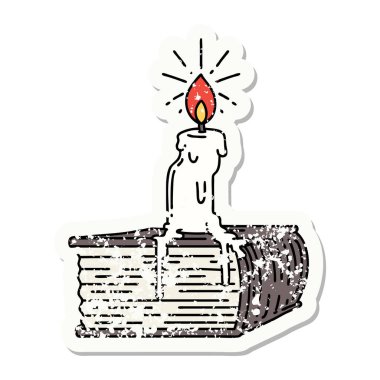 Dövme stili eski bir çıkartma. Kitapta eriyen mum.