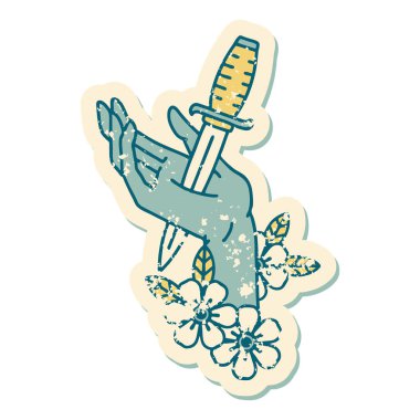 Elindeki hançerin sembolik dövmeli görüntüsü.