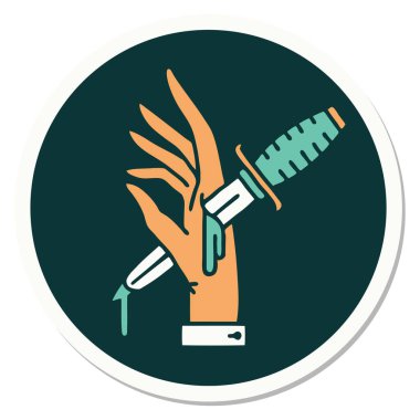 Eline geleneksel bir hançer stili dövme çıkartması takılmış.