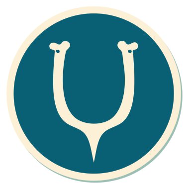 Geleneksel bir dilek kemiği stiliyle dövme çıkartması.