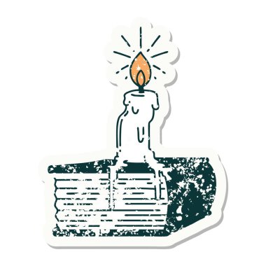 Dövme stili eski bir çıkartma. Kitapta eriyen mum.