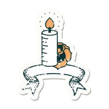 Eski bir etiket, bir mum ve bir gül bayrağı.