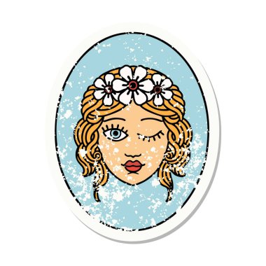 Çiçekten taç takmış geleneksel bir bakire dövmesi.