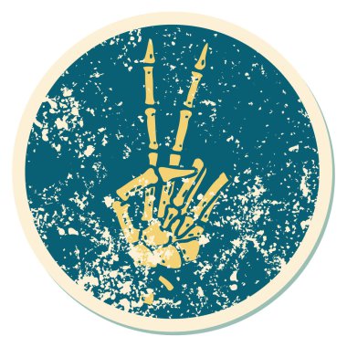 Bir iskeletin barış işareti verdiğinin sembolik dövmesi. 