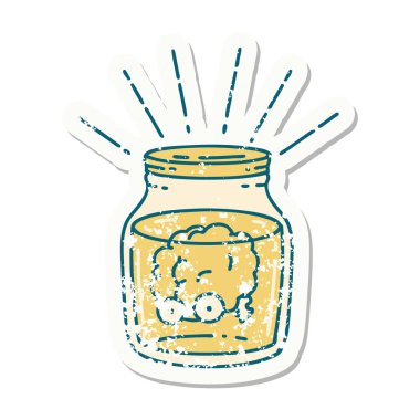 Kavanozda dövmeli eski bir beyin çıkartması var.