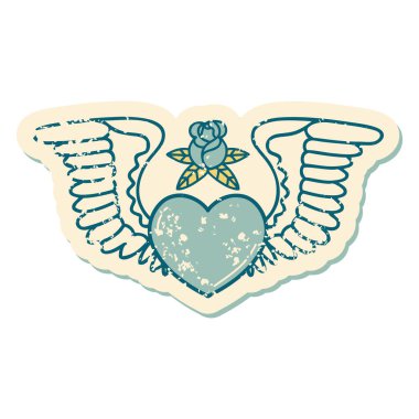 Kanatlı bir kalbin sembolik dövmesi.