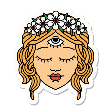 Geleneksel kadın yüzü stili dövme çıkartması. Üçüncü gözü ve çiçek tacıyla.