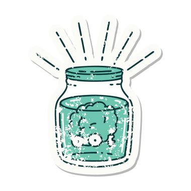 Kavanozda dövmeli eski bir beyin çıkartması var.