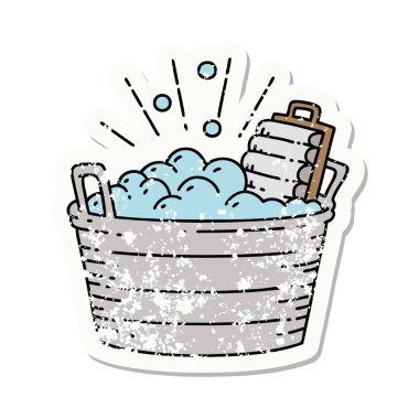 Dövme stili eski bir çıkartma eski bir çamaşır tahtası ve fırçalama kabı. 