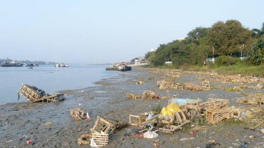 Ganges Water Pollution Polluted holy Ganga with human waste, industrial leftovers, domestic sewage and religious rituals from towns cities poses threat to health environment. Kolkata India May 2019