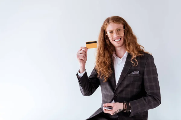 Smiling Tattooed Businessman Curly Hair Showing Credit Card Isolated White — Stock Photo, Image