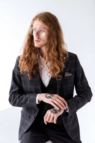 Stylish Tattooed Businessman Curly Hair Looking Away White — Free Stock Photo