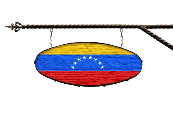 Flaga Wenezueli na tablicy. Owalne kolory tablic flaga Wenezuela wisi na metalowej konstrukcji kute. Szablon wyizolowany na białym. — Zdjęcie stockowe
