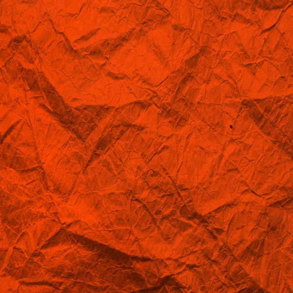 Orange paper. Kraft paper texture Lush Lava color. Background recycled paper.