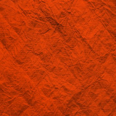 Orange worn paper. The texture of crumpled kraft paper Lush Lava color. Background recycled paper. 