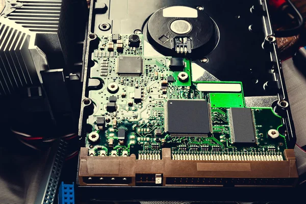 HDD. Old computer hard drive. Microchips and PC components, storage data and information recovery. — Stok fotoğraf